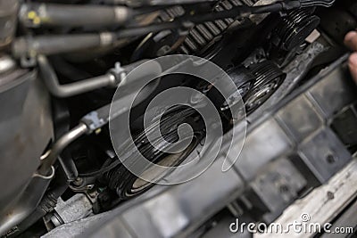 Broken belt in the car engine 2 Stock Photo