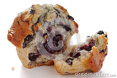 Broken blueberry muffin Stock Photo