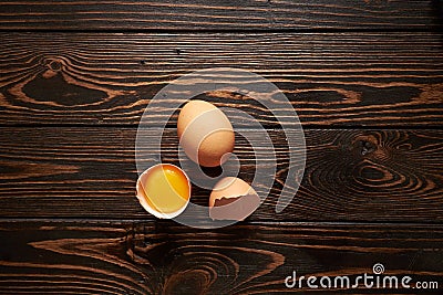 Broken brown eggs Stock Photo