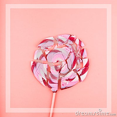 A broken candy in the color of the year promotes a healthy diet and anti sugar. Stock Photo