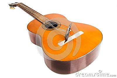 Broken classical guitar with detached bridge isolated in white b Stock Photo