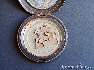 Broken compact powder Stock Photo