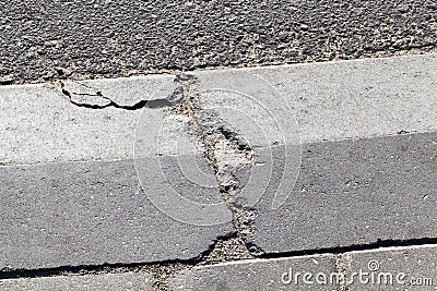 Broken concrete curb Stock Photo