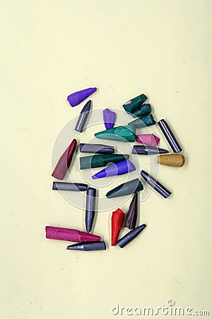 Broken crayon tips. Broken crayons. Crushed crayons. Stock Photo