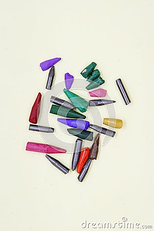 Broken crayon tips. Broken crayons. Crushed crayons. Stock Photo