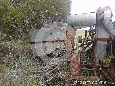 Broken down farm machinery Stock Photo