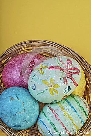 Broken easter eggs in a basket Stock Photo