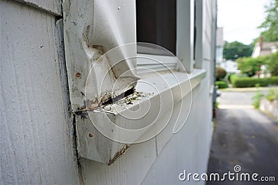 Close up Aluminum window trim damage do it yourself Stock Photo