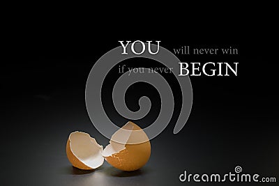 broken egg on black background and epigram. Stock Photo