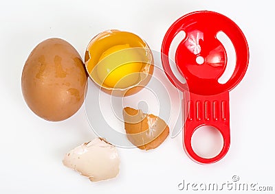 Broken eggs, separation of yolk Stock Photo