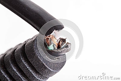 Broken electrical wire with a plug on a white background, isolate, close-up. Electric shock Stock Photo