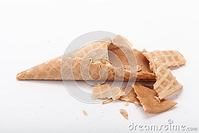 Broken empty sugar waffle cones on white background Stock Photo