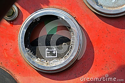 BROKEN GLASS ON OLD TRACTOR DIAL Stock Photo