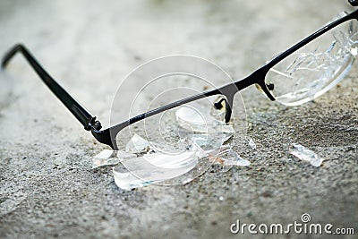 broken glasses on the asphalt Stock Photo