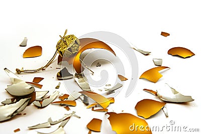 Broken golden ball Stock Photo