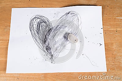 Broken Heart, Heart deleted by Eraser Stock Photo