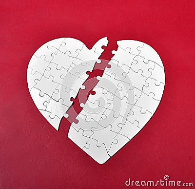 Broken heart puzzle Stock Photo