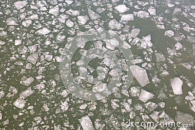 Broken ice floes floating on the river aerial view from drone Stock Photo