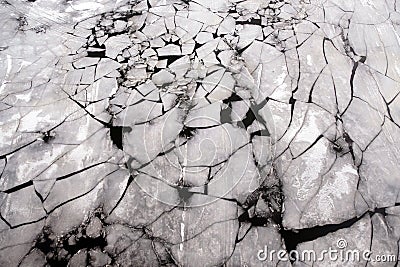 Broken ice floes floating on the river aerial view from drone Stock Photo