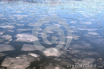 Broken ice floes floating on the river in spring day Stock Photo