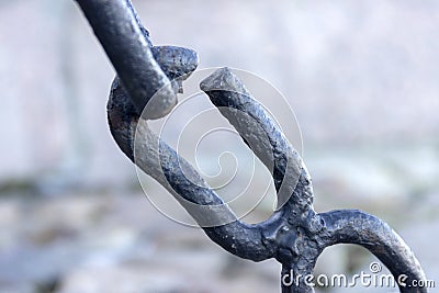 The broken link of an old rusty chain Stock Photo