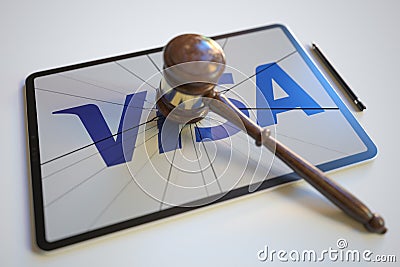 Broken tablet computer screen with logo of VISA and judge's gavel. Editorial conceptual 3d rendering Editorial Stock Photo