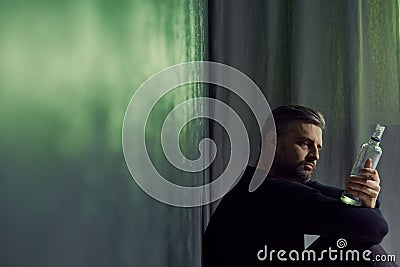 Broken man with alcohol Stock Photo