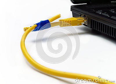 Broken network cable from laptop connected anyhow with insulating tape Stock Photo