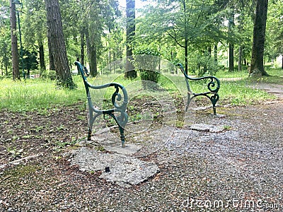 Broken metal branch seat outdoors without seating no place Stock Photo