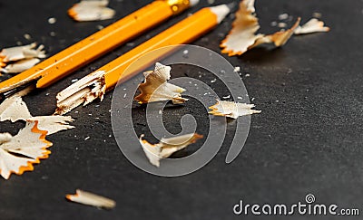 Broken pencil with shavings. Stock Photo