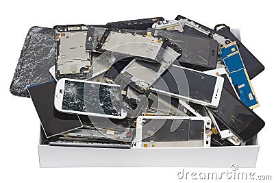 Broken phones and tablets in the white cardboard box Stock Photo