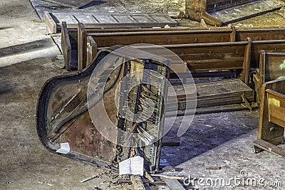 Broken Piano in an Abandoned Church Stock Photo