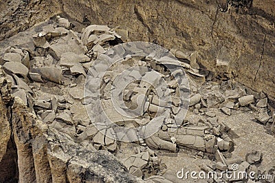 The broken pieces of Terracotta Army Editorial Stock Photo