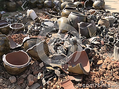 Broken pottery, such damage usually happens from burning in kiln by wrong temperature inside. Editorial Stock Photo