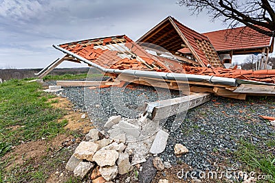 Broken roof after a storm Stock Photo