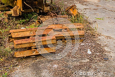 Broken and rusted bulldozer tracks Stock Photo