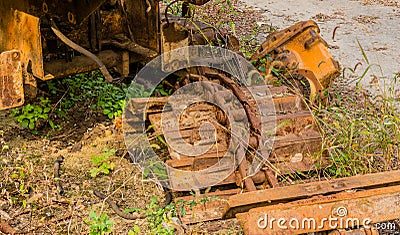 Broken and rusted bulldozer tracks Stock Photo