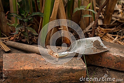 Broken Spade in the garden Stock Photo