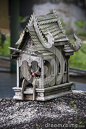 Broken spirit house in thailand Stock Photo