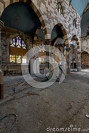 Broken Stained Glass and Collapsing Floor & Ceiling - Abandoned Church Editorial Stock Photo
