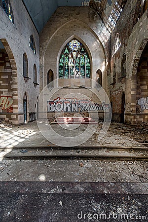 Broken Stained Glass Windows at the Altar - Abandoned Church - New York Stock Photo