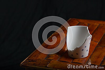 Broken tea cup Stock Photo