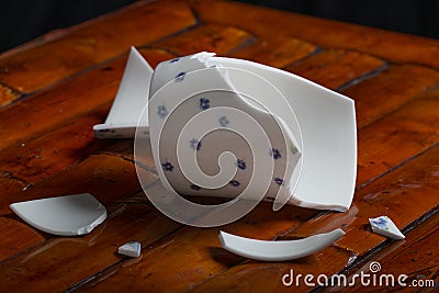 Broken tea cup Stock Photo