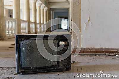 Broken television set in the interior of abandoned building of the Soviet sanatorium Georgia in Gagra, Abkhazia Editorial Stock Photo