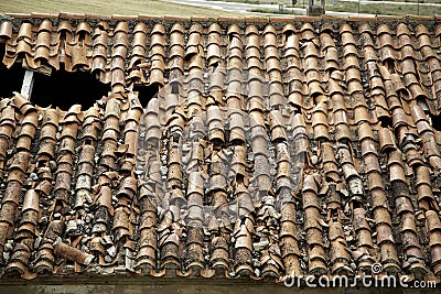 Broken tile roof Stock Photo