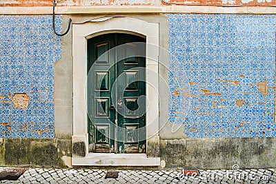 Broken vintage blue Portuguese azulejo tiles in Tomar, Portugal Stock Photo