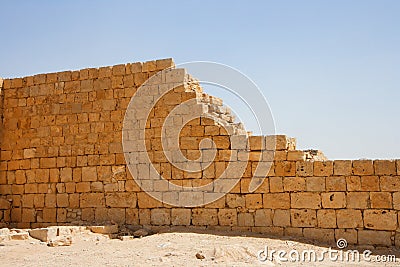 Broken wall of ancient temple Stock Photo