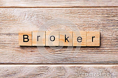 Broker word written on wood block. broker text on wooden table for your desing, concept Stock Photo