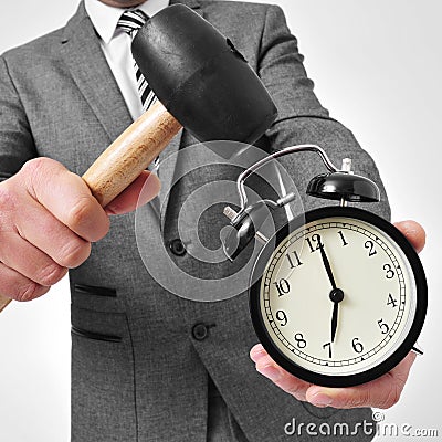 Broking an alarm clock Stock Photo