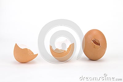 Brokken and cracked egg shell on white background Stock Photo